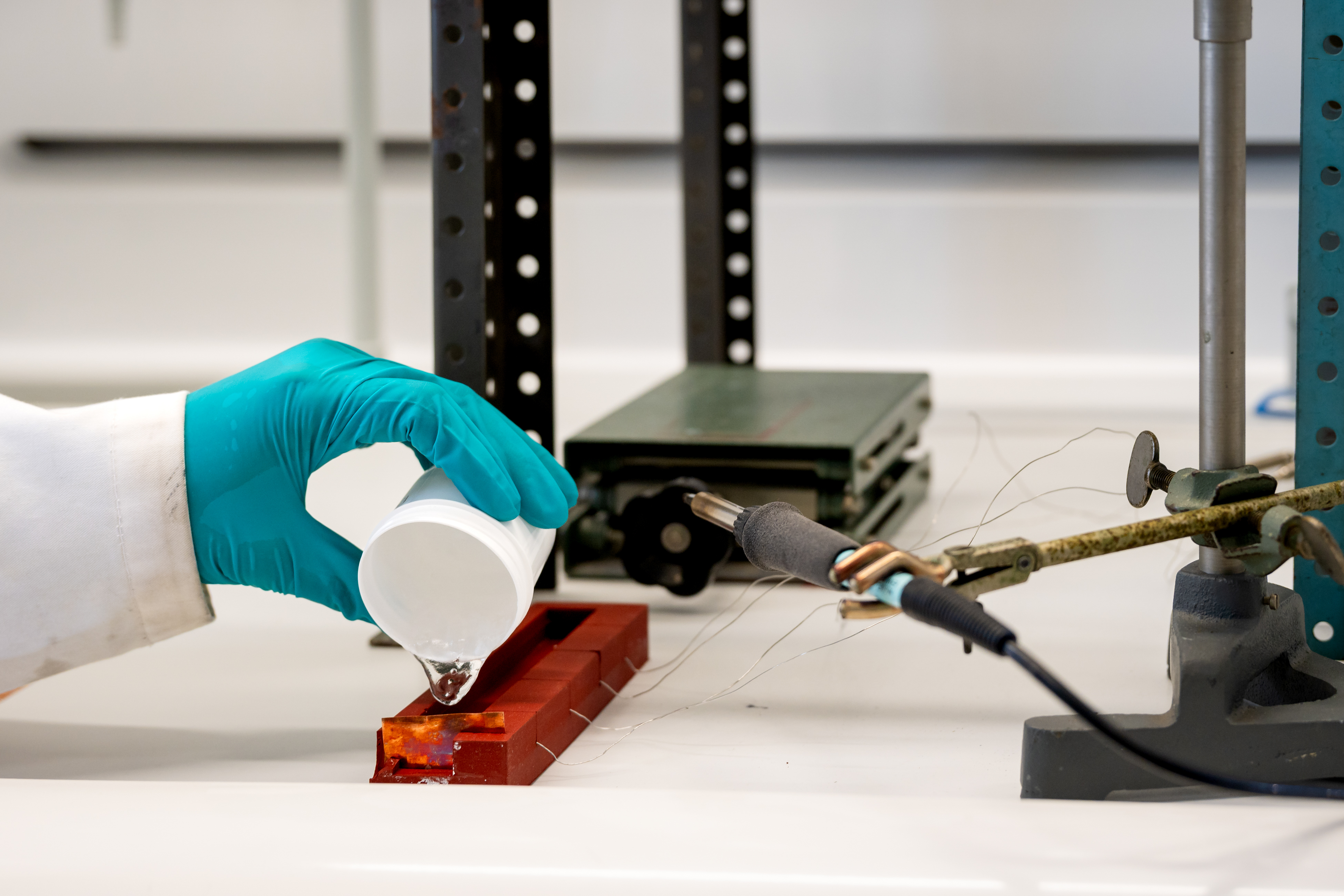 Close-up researcher working with polymers